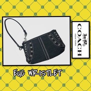 EUC BLACK COACH WRISTLET WITH SILVER DETAIL
